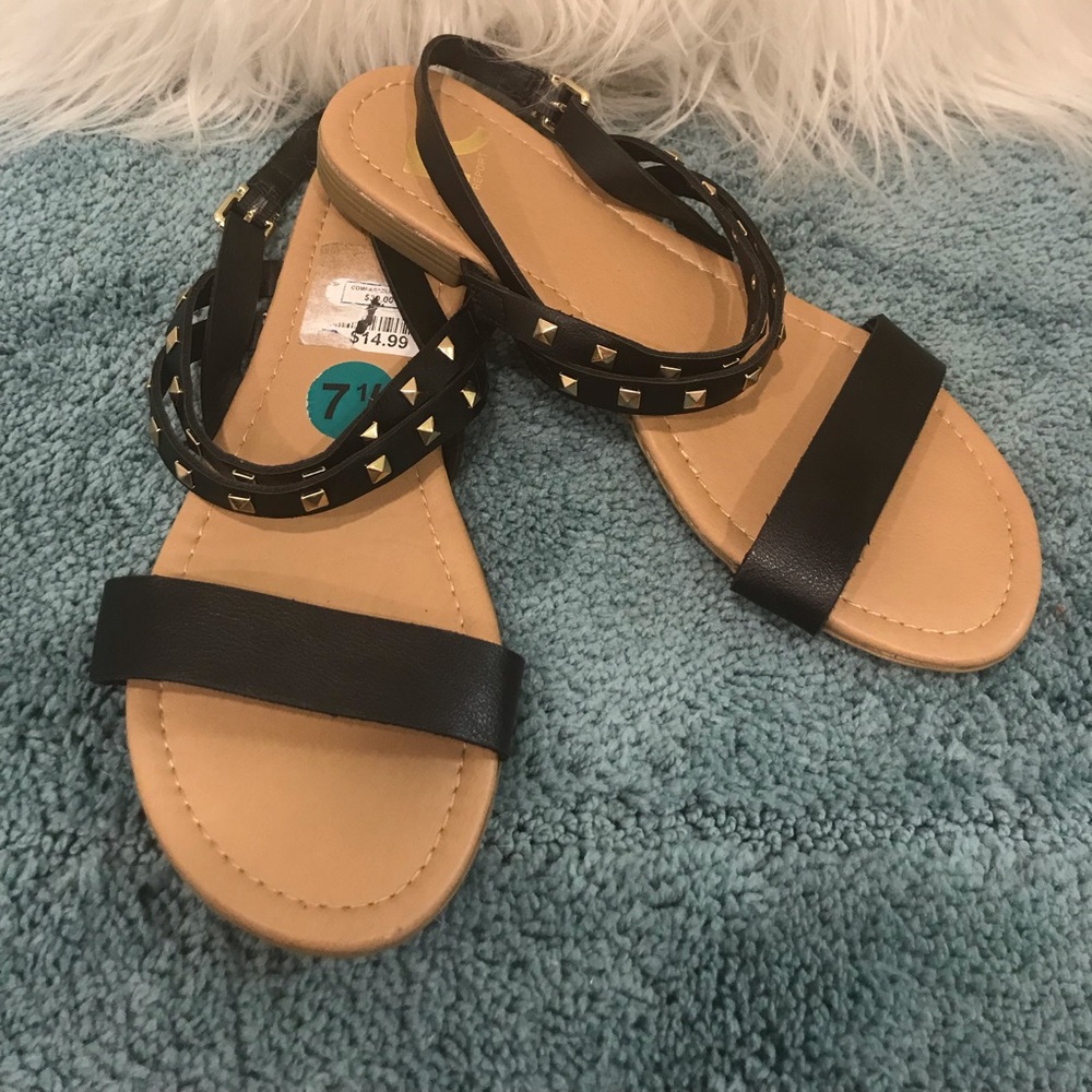 Report Black and gold stud sandals